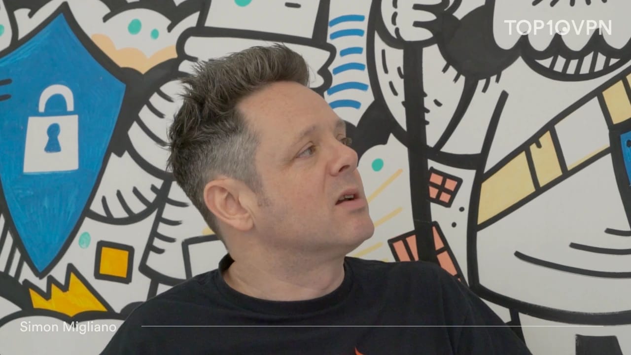Head of Research Simon Migliano mid-conversation in the Top10VPN office