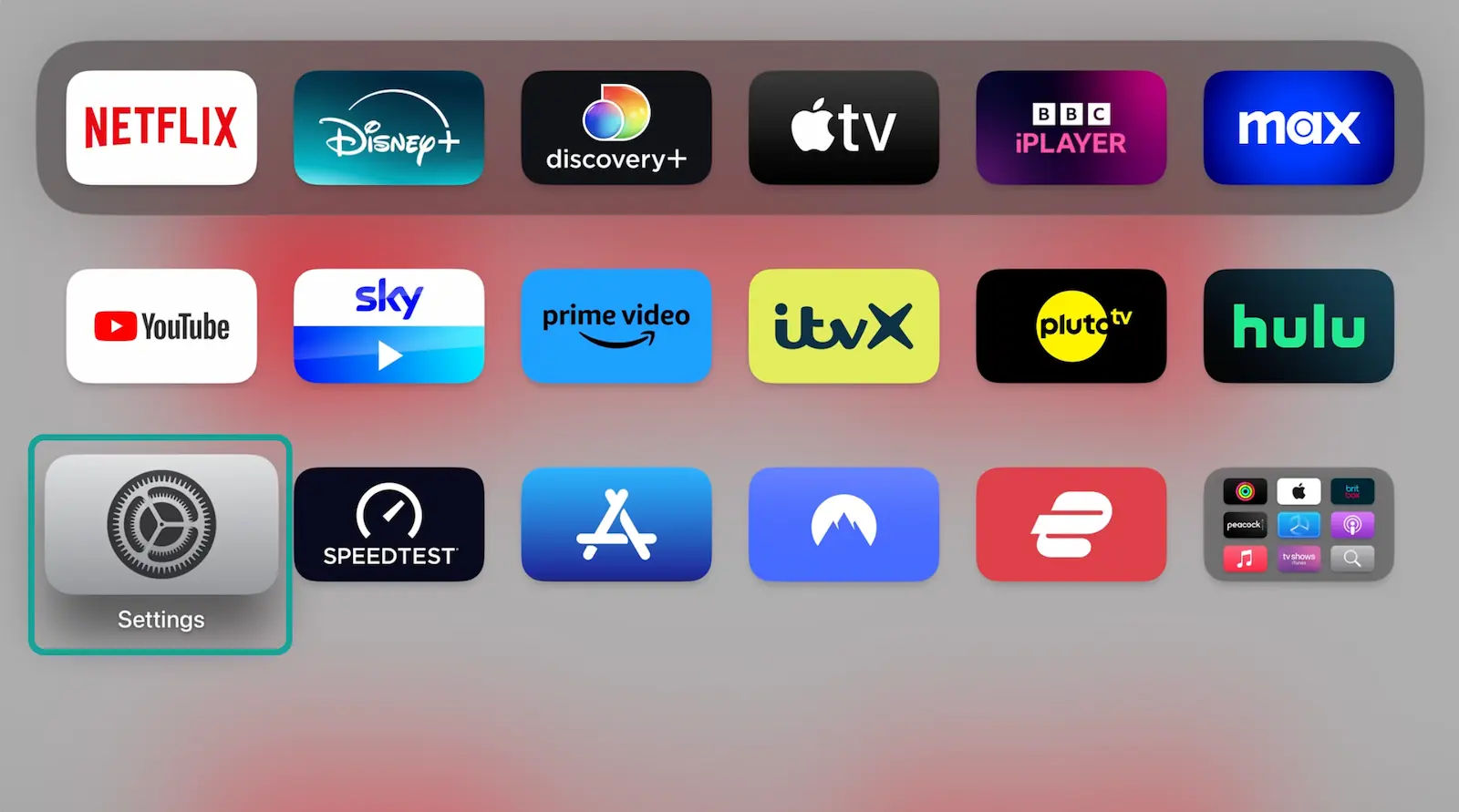 The Settings app highlighted on the Apple TV home screen